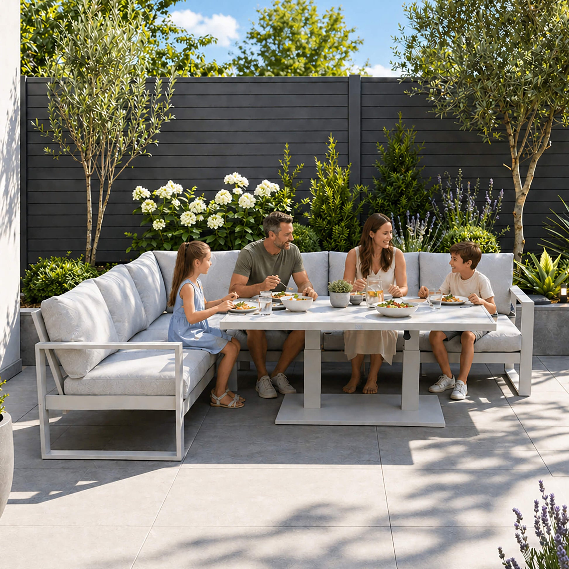 A family of four dining outdoors on the Como L-Shaped outdoor furniture corner set in a modern patio setting.