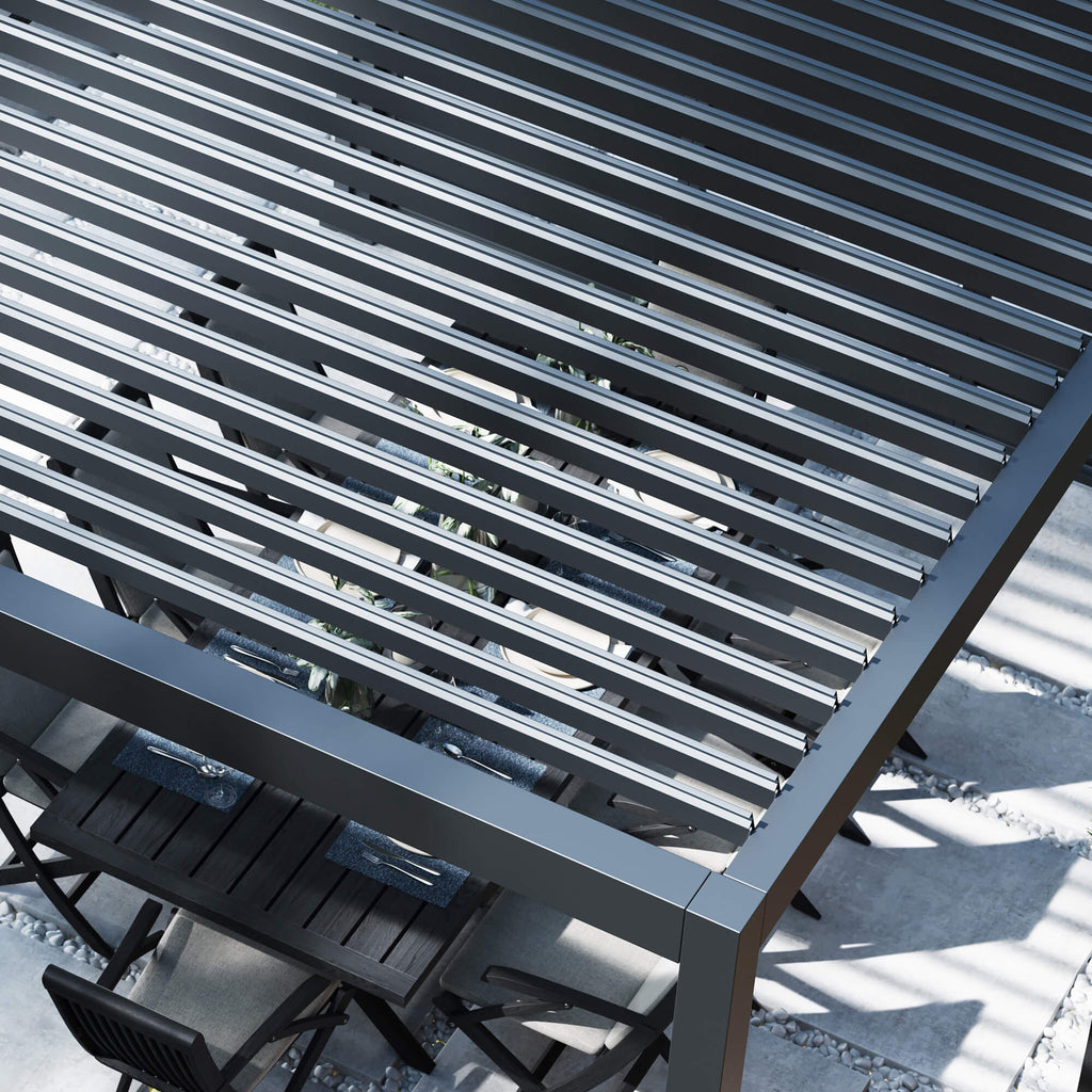 Overhead perspective of a Riva Aluminium Pergola on garden patio, showcasing the opened double-skin louvred roof.